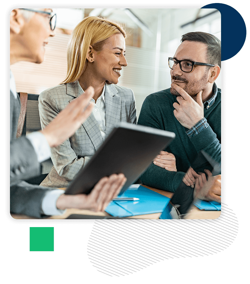 Smiling couple working with banker